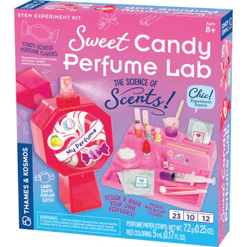 A blue and pink box with Sweet Candy Perfume Lab printed on the front shows the lab included inside and the bottle containing the custom-made perfume